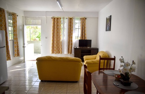 Castle Comfort Apartment | Large 2 Bedroom 2 Bathroom Apartment #4 in Roseau. Bus stops right in front!