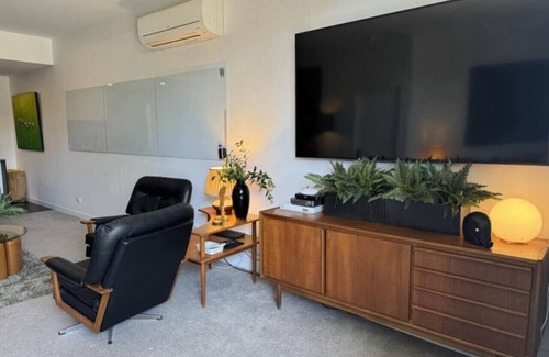 Braddon Condo | Large Mid Century Styled Studio in the heart of Braddon