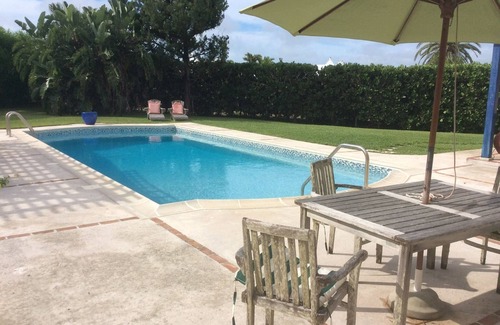 Smith's Apartment | Las Brisas apartment with pool and walk to beach + EV chargers