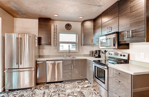 Colorado Springs House | Lightning Laboratory — electricity decor, mural ceiling, secret patio, W/D