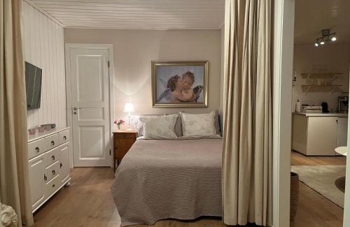 Harnosand Cabin | Lilla gröna huset på gården