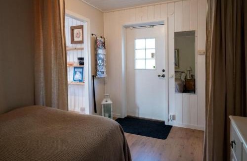 Harnosand Cabin | Lilla gröna huset på gården