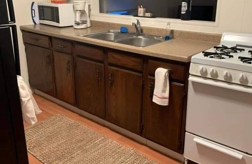 Shawano Cottage | Lilly Pad North, Cottage #4 is on Shawano Lake, nestled among 4 other cottages. Beautifully located. Relaxing days on the beach and sunsets by the firepit are the best.