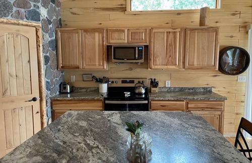 Grand Rapids Cabin | Little Red Cabin steps from beautiful lake Wabana!