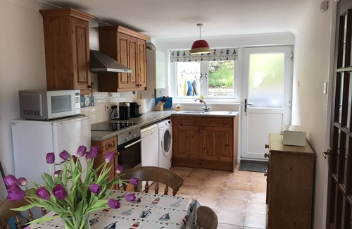 Porthtowan House | Located 60m from beach and situated opposite the sand dunes. Loved by families.