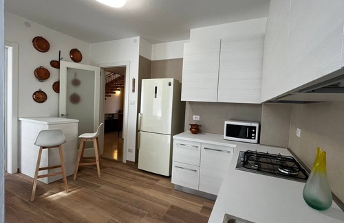 Belluno House | Locazione Glicine with 3 rooms for 4 guests with private parking and garden.