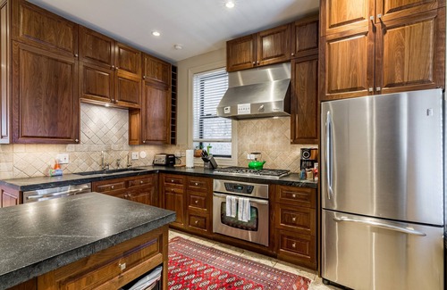 Logan Square Apartment | Logan Blvd Luxury! Enjoy the Well-Equipped Kitchen and Prime Location by AllSet Turnover