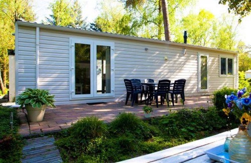 Schaarsbergen House | Lovely apartment in villa for 4 people with WIFI, pool, TV and terrace