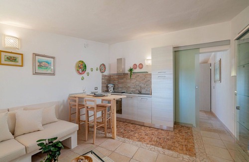 Eden Beach Villa | Lovely apartment in villa for 3 guests with WIFI, pool, A/C, TV and patio