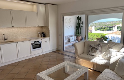 Capo Ferro Apartment | Lovely flat by the beach - surrounded by nature - with beach services included