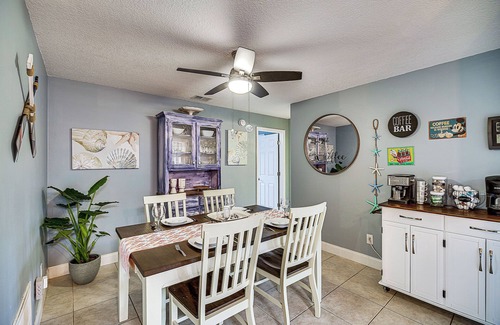 Surfside Estates Cottage | Lovely Merritt Island Home w/Kayak + Fire Pit!