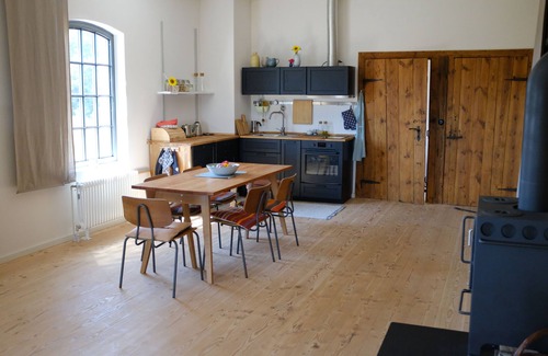 Haarstorf Apartment | Lovingly converted workshop in former stable building
