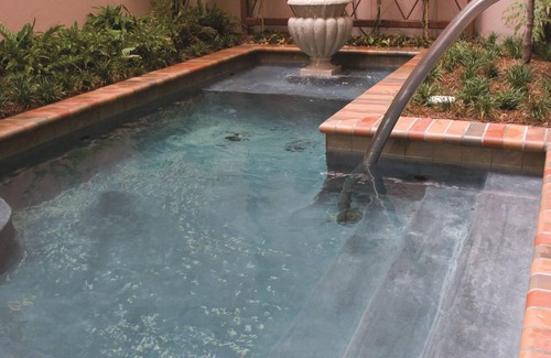 Central Business District Apartment | Luxe Warehouse District 2BR w/Resort Outdoor Saltwater Spa & Indoor Hot Tub