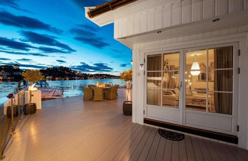 Arendal House | Luxurious Boathouse with Private Dock in the Best Location in Arendal