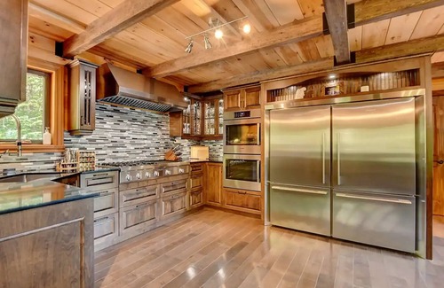 Saint-Calixte Ski Chalet | Luxurious chalet featuring a jacuzzi, pool, small lake, sauna and pool table.