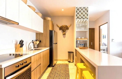 Luis Donaldo Colosio Condo | Luxury 2 Bedroom condo with beach access, WiFi, gym & more in Playa del Carmen