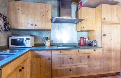 Courchevel Ski Chalet | Luxury Chalet for 10 with Ski-In/Ski-Out Access, Fireplace, and Private Garage in Courchevel Village