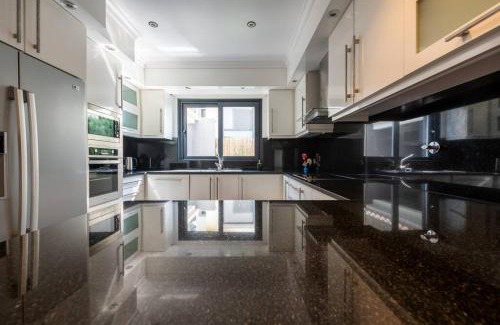 Canhas Villa | Luxury Haven: Heated Pool, AC & Sun