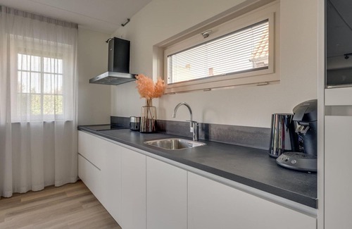 Ossenisse House | Luxury Holiday Home With hot Tub, in Zeeland