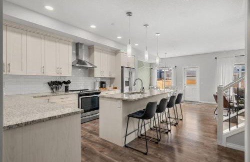 Northwest Calgary House | Luxury Living with BBQ, 2 Car Garage, Central AC, Free Banff Entry Pass