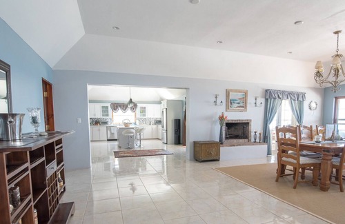 Southampton House | Luxury Villa with Stunning Views of Horseshoe Bay on the Turtle Hill Golf course