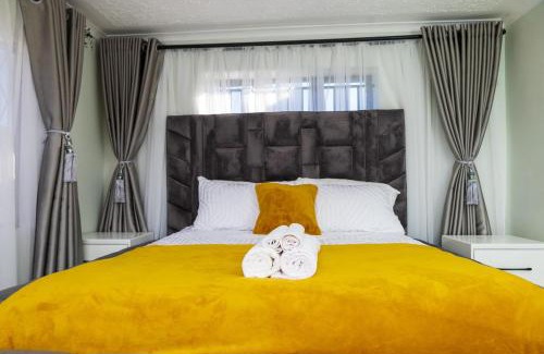Ruwa House | M&M SIGNATURE HOME 4 BEDROOMS SLEEPS 8 in RUWA LUXURIOUS AMENITIES DECO AND GAZEBO