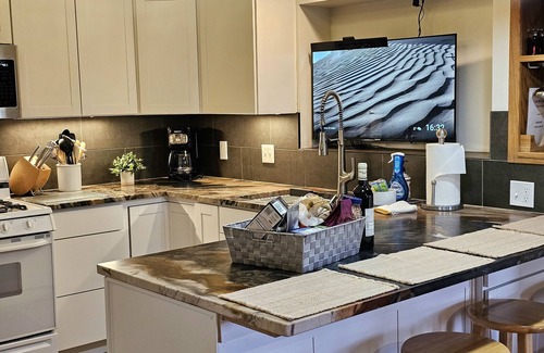 Four Corners House | Magnificent willow shade trees, waterfall, and sleeping comfort.nBook this Home!