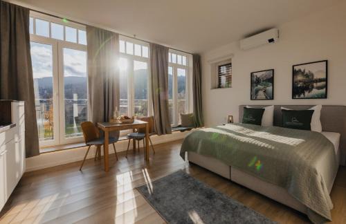 Miltenberg Apartment | MAINTERRASSE Boardinghouse am Fluss klimatisierte Apartments mit 80qm Terrasse