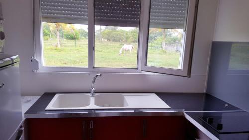 Macouria House | Maison charmante à Macouria avec jardin et climatisation.