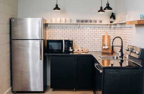 East Market District Apartment | Market #8 · Stellar Suites | The Sunset Suite | NuLu | Bikes