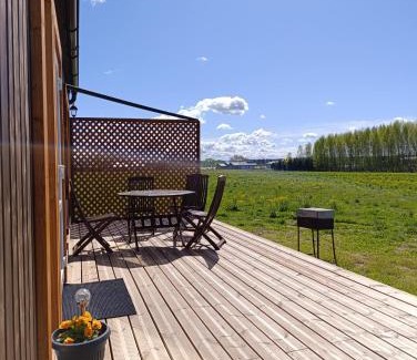 Ikskile House | Meadow view cabin with Optional Sauna & Hot Tub