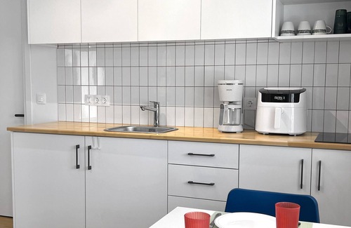 Olymbiaki Akti Apartment | Minimalist Seaside Apartment with Patio and Parking - Blue Zone Homes