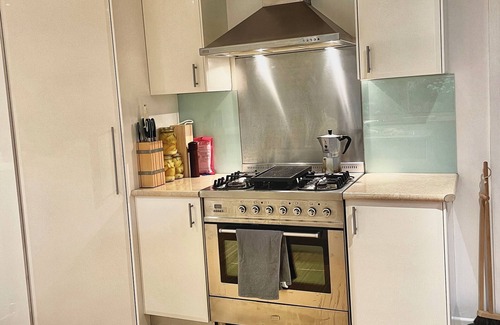 Arrawarra Headland House | Minutes walk to stunning Mullaway beach. Huge house with swinging veranda chair.