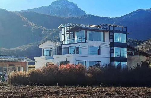 Shangri-La Hotel | Miyinxianye Snow Mountain Makino Migratory Bird Viewing B&B Napa Sea Scenic Area Branch