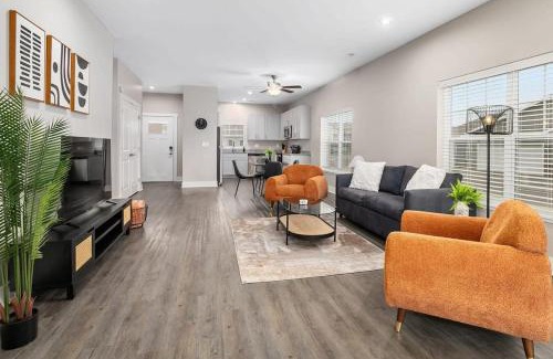 Grandville Apartment | Modern 16BR 16BA Condos w Garage and Patio