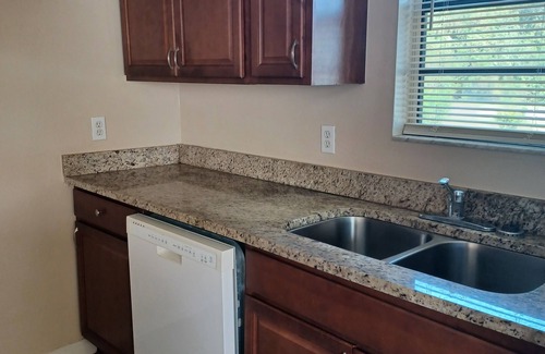 Interchange Square Apartment | Modern 2-bedroom with AC and WiFi in charming Palm Bay. Clean with Washer/Dryer.