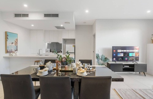Macgregor Apartment | Modern 2BR Apartment Balcony & Central Convenience
