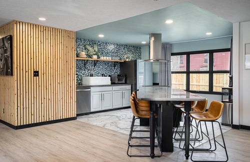 Lawrence House | Modern 3 BR home w/hot tub, movie room, dog park