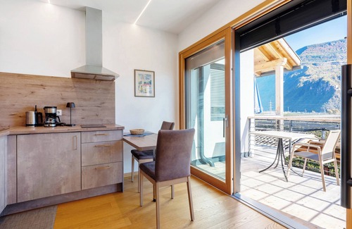 Andriano Apartment | Modern Apartment "3 Weger" with Panoramic Mountain View, Beautiful Balcony & Wi-Fi