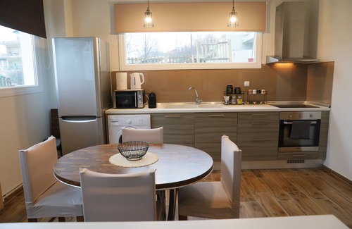 Maniakoi Apartment | Modern apartment with a lake view for a comfortable stay. Easy parking space