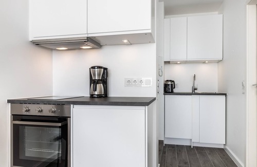 Westerland Apartment | Modern app. with sea view, balcony, parking space, WLAN. Pets allowed.