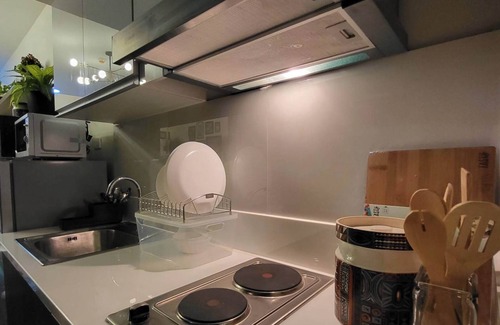 Legazpi Village Condo | Modern Asian themed Condo w/View Near Airport & Sky Way - 1