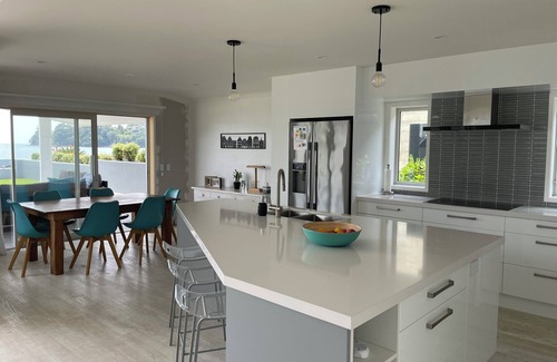 Whitianga House | Modern beachfront holiday home, close to town in Whitianga