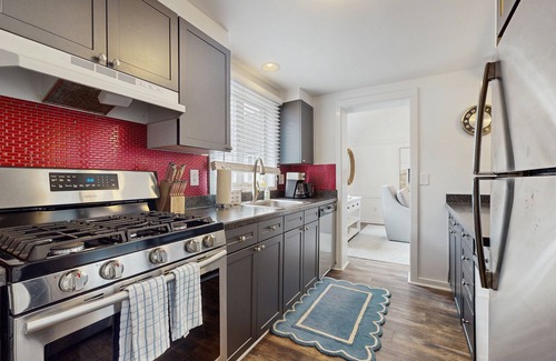 Mews Village Condo | Modern condo near golf & beach with AC, deck, W/D and board games