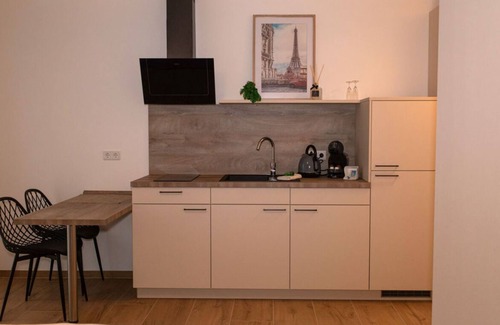 Jollenbeck Condo | Modern cozy purple apartment