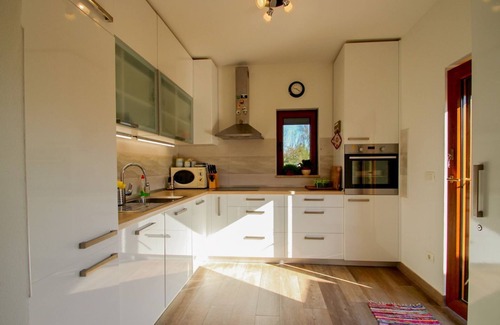 Dajla House | Modern holiday home with whirlpool, garden, sun loungers, barbecue