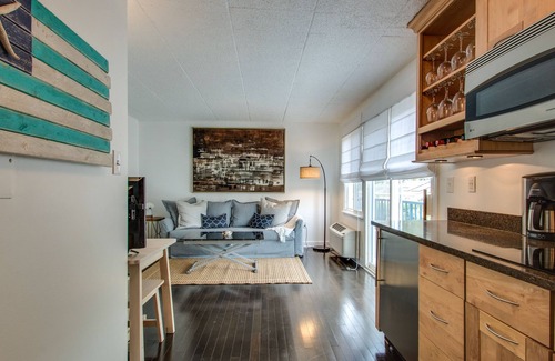 The Pines Condo | Modern in-town condo with parking on Rehoboth Ave and linens now included!