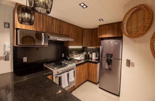 Colonia Cuauhtemoc Apartment | Modern Meets Metal: Industrial Elegance Defined in Every Corner's Craft.n