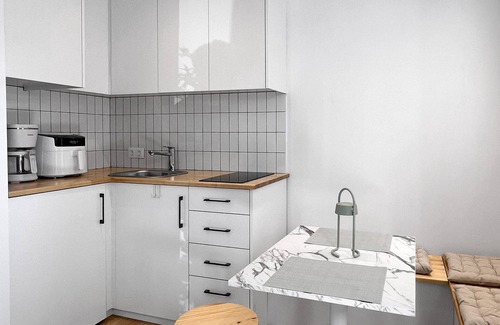 Olymbiaki Akti Apartment | Modern Seaside Home with Private Patio + Parking - Blue Zone Homes
