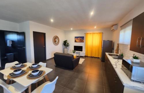 Tera Kora Apartment | Modern sunshine yellow apartment with nature views